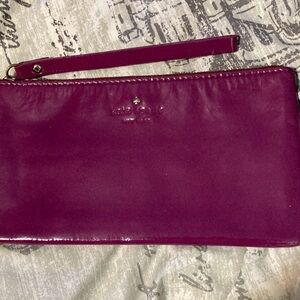 Kate Spade - Harrison Street Jenny Ann Wristlet in vibrant Purple Patent Leather